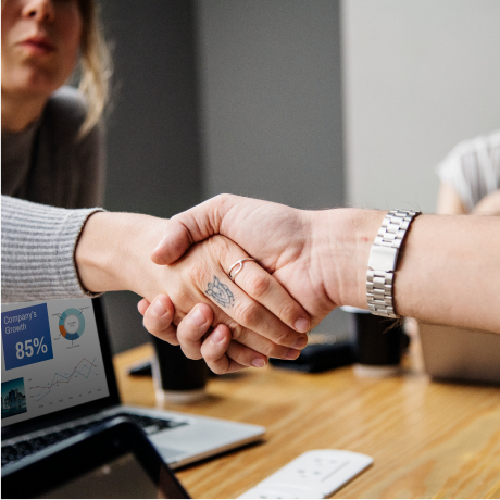 business-people-shaking-hands-agreement-2.png